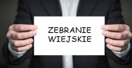 Postać (tułów) trzymająca przed sobą kartkę z napisem: 